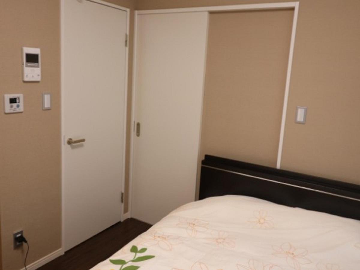 Aparthotel Mr. Kinjo In Makishi Naha Zimmer foto